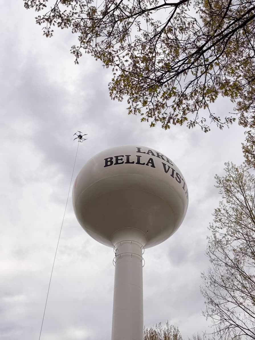 Drone cleaning the Lake Bella Vista municipal water tower